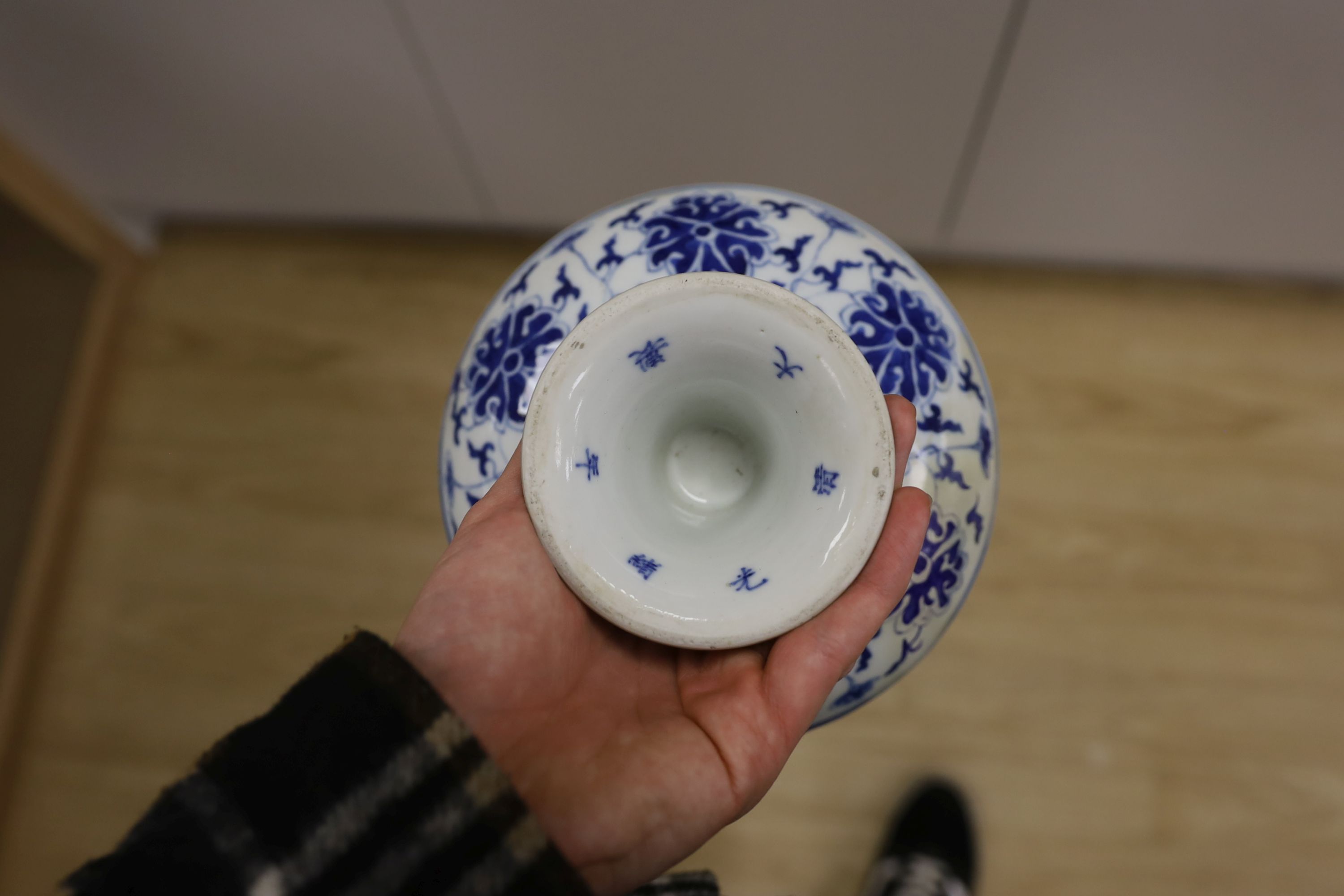 A Chinese underglaze copper red ‘herder and goats’ vase, Kangxi six character mark but Republic period and a Chinese blue and white lotus stem dish, six character Guangxu mark and period, both damaged